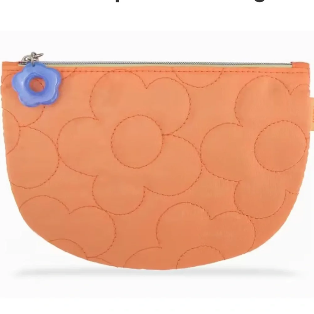 NWT April Ipsy Glam Bag! Orange Quilted Pouch with Blue Flower Charm